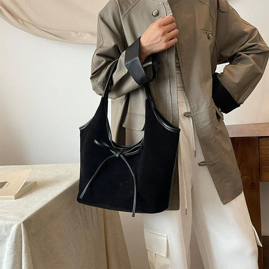Carla™ |  Borsa con fiocco